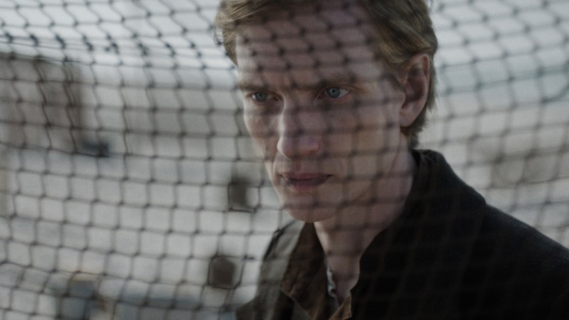 Hein, seen through a fishing net