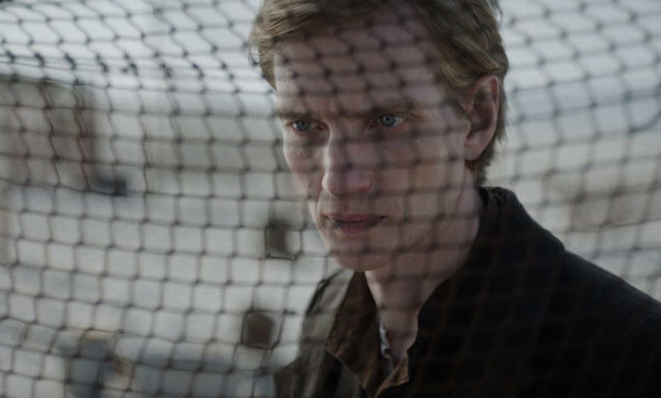 Hein, seen through a fishing net