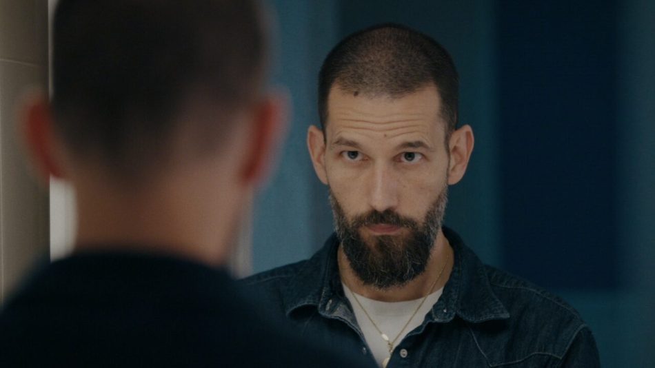 director Marcel Wyss looking in mirror