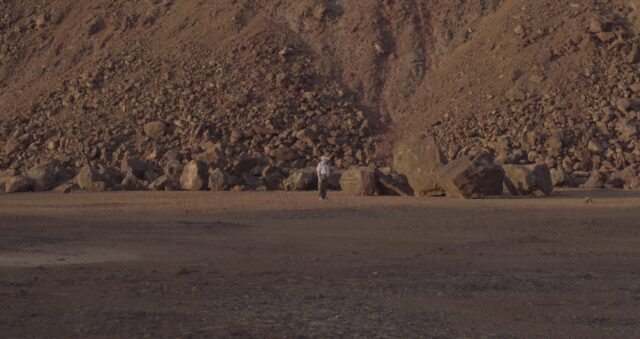 Man in rocky landscape
