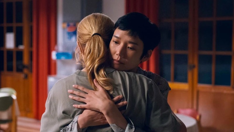 Marie-Lou and Mari embracing