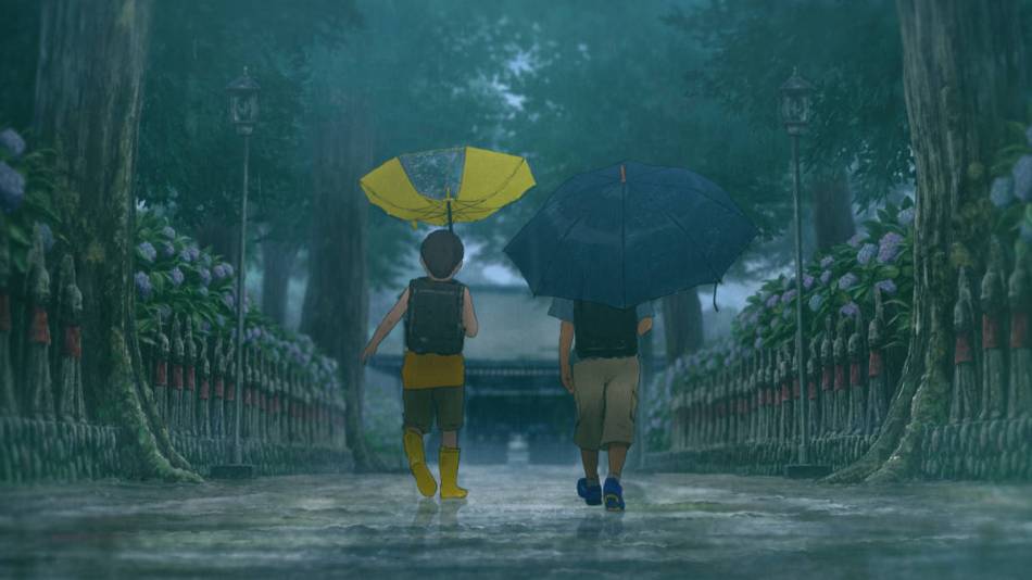 Two boys walking in the rain