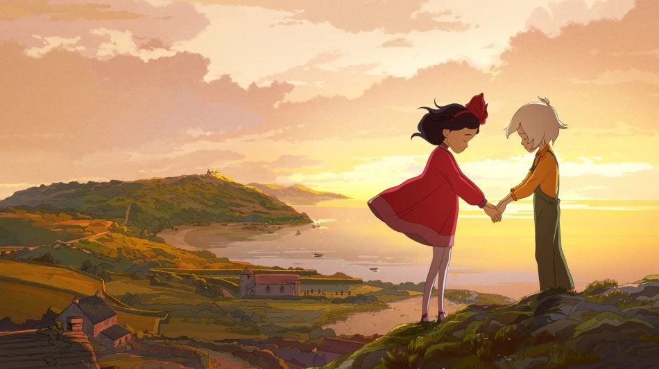 Lucy and Millie holding hands at sunset