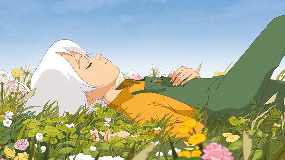 Lucy lying in the grass, looking at sky