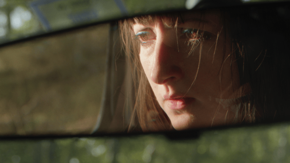 Chiara looking in rear mirror