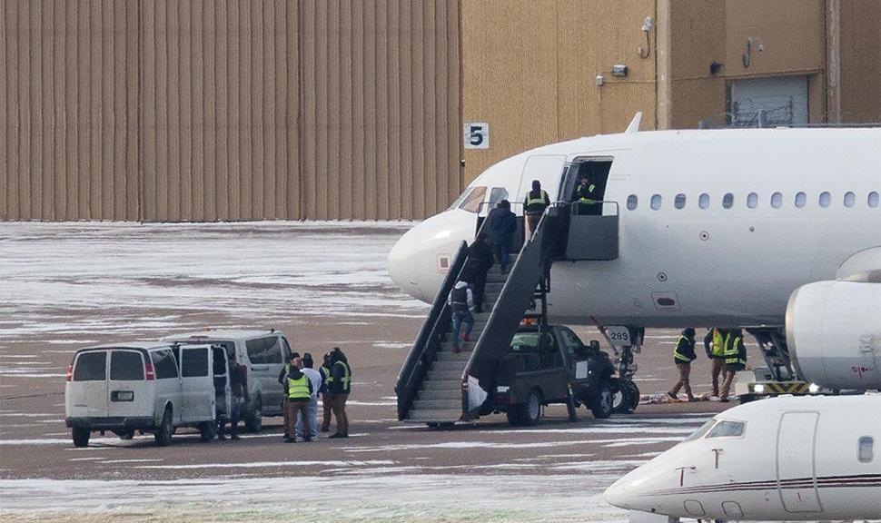 People forced into an aireplane