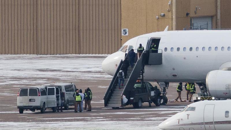 People forced into an aireplane