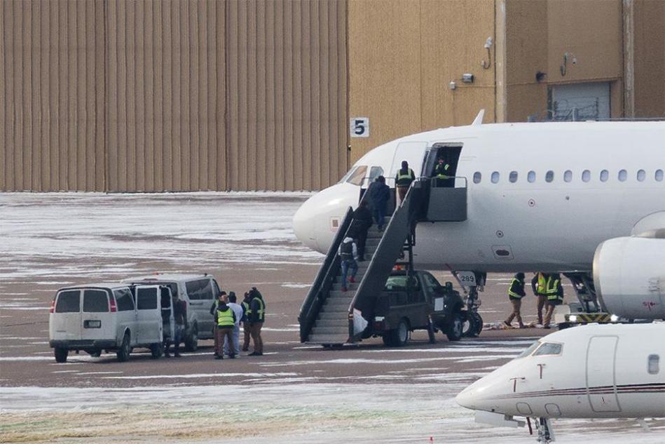 People forced into an aireplane
